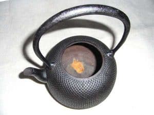 how to clean a cast iron teapot